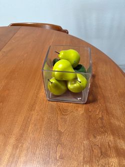 Glass bowl with artificial pears