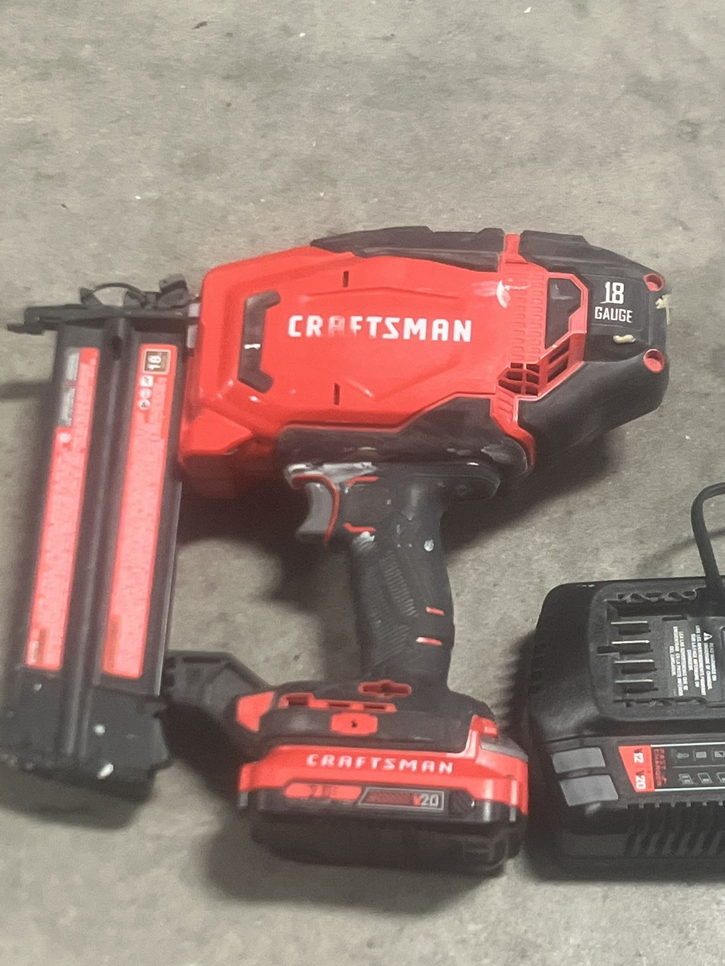 Craftsman CMCN618 20V 18 Gauge Brad Nailer with battery and charger. Used in good condition with minor cosmetic blemishes associated with normal usage
