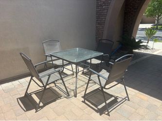 Table and 4 folding chairs