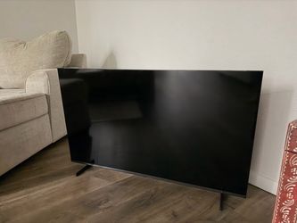 Large Flat Screen TV with Stand