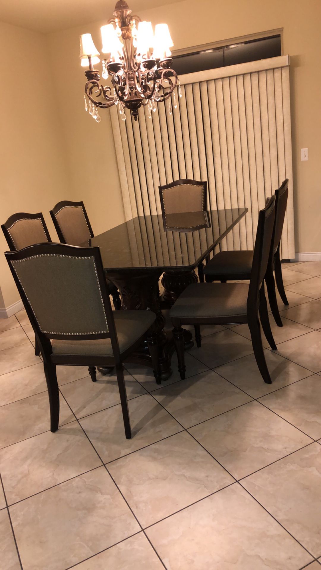 Granite dining room table with 6 chairs