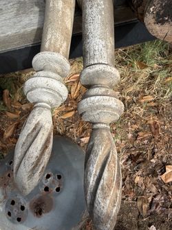Antique bed post tops and table legs.