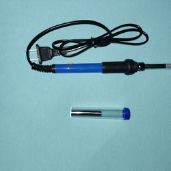 Soldering iron and solder