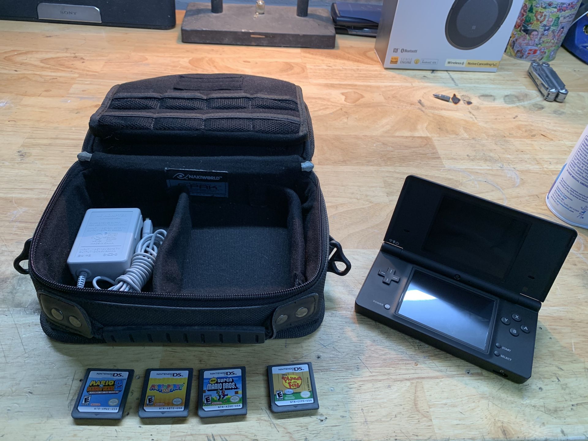 DSi with 4 games and case