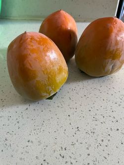 Fresh persimmons 3 for $1.00