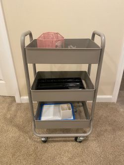 Rolling storage cart grey used once like new!! Dimensions - 18X27 $20