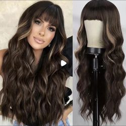Human hair blend brown with blonde highlights wavy wig.