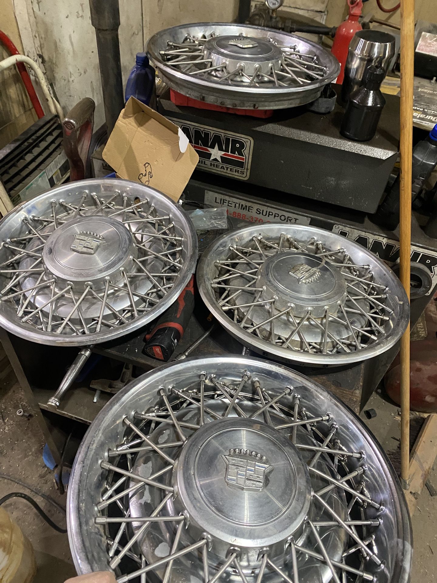 76 cadillac rim covers 