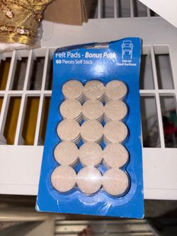 self-stick felt furniture pads from the brand Waxman, designed to protect hard surfaces from scratches