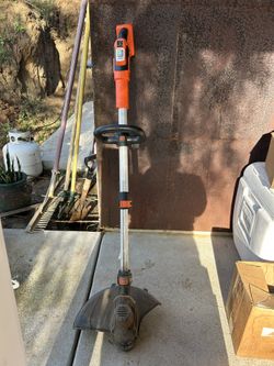 Black & Decker Weed whacker.  No Battery.
