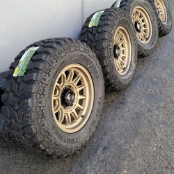 17" Fetiipaldi rims w/ 33" R/T tires.  $1750