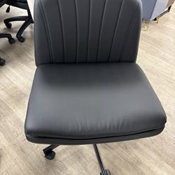 New black faux leather criss cross office chair