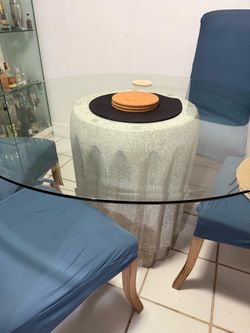 Round glass table with stone center