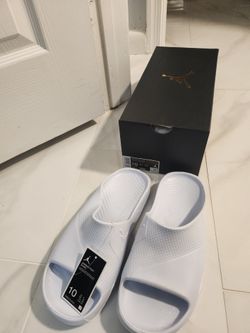 Brand new Jordan blue slides sz 10