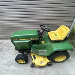 John Deere 318 Lawn Tractor for trade for landscape trailer or For Sale.  