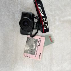 Cannon EOS  & Travel Bag w/instructions