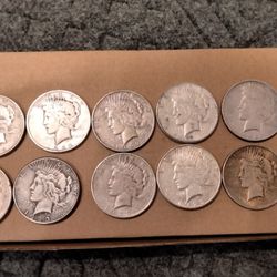 PEACE SILVER DOLLARS 10/$275