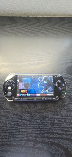 Psp 1000 with a 64gb memory card full of games