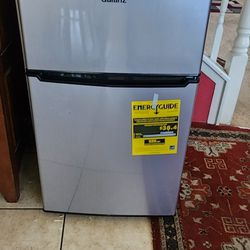 Mini Fridge Like New Lghtly Used Will Fit In A Car Size Is On The Photos 