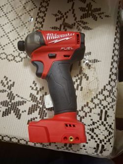 New Milwaukee 1/4 surge  impact tool only