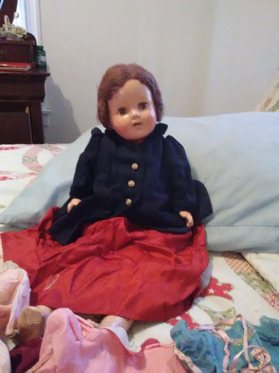 Antique doll w/ cloths