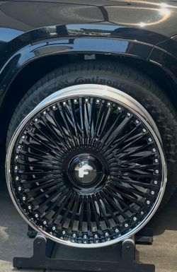 24 Inch Forgiato’s Black and Chrome custom rims