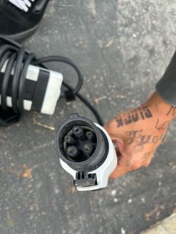 ELECTRIC VEHICLE CHARGERS, ONE TESLA CHARGER AND ONE ULTIUM CHARGER, ADAPTABLE AND IN GREAT CONDITION AND FULLY FUNCTIONAL