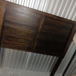 Full size wood bed frame with box and memory foam mattress.