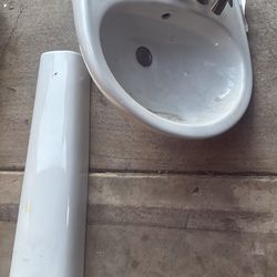 White Pedestal Sink with Faucet