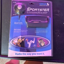 The Sirius SP H2 Sportster Home Docking Station Home Antenna is a sleek black desktop device designed for SiriusXM satellite radio users. This model i