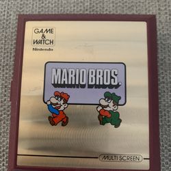 Vintage Nintendo Mario Bros Handheld Game