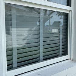 Two Matching Faux Wood Blinds
