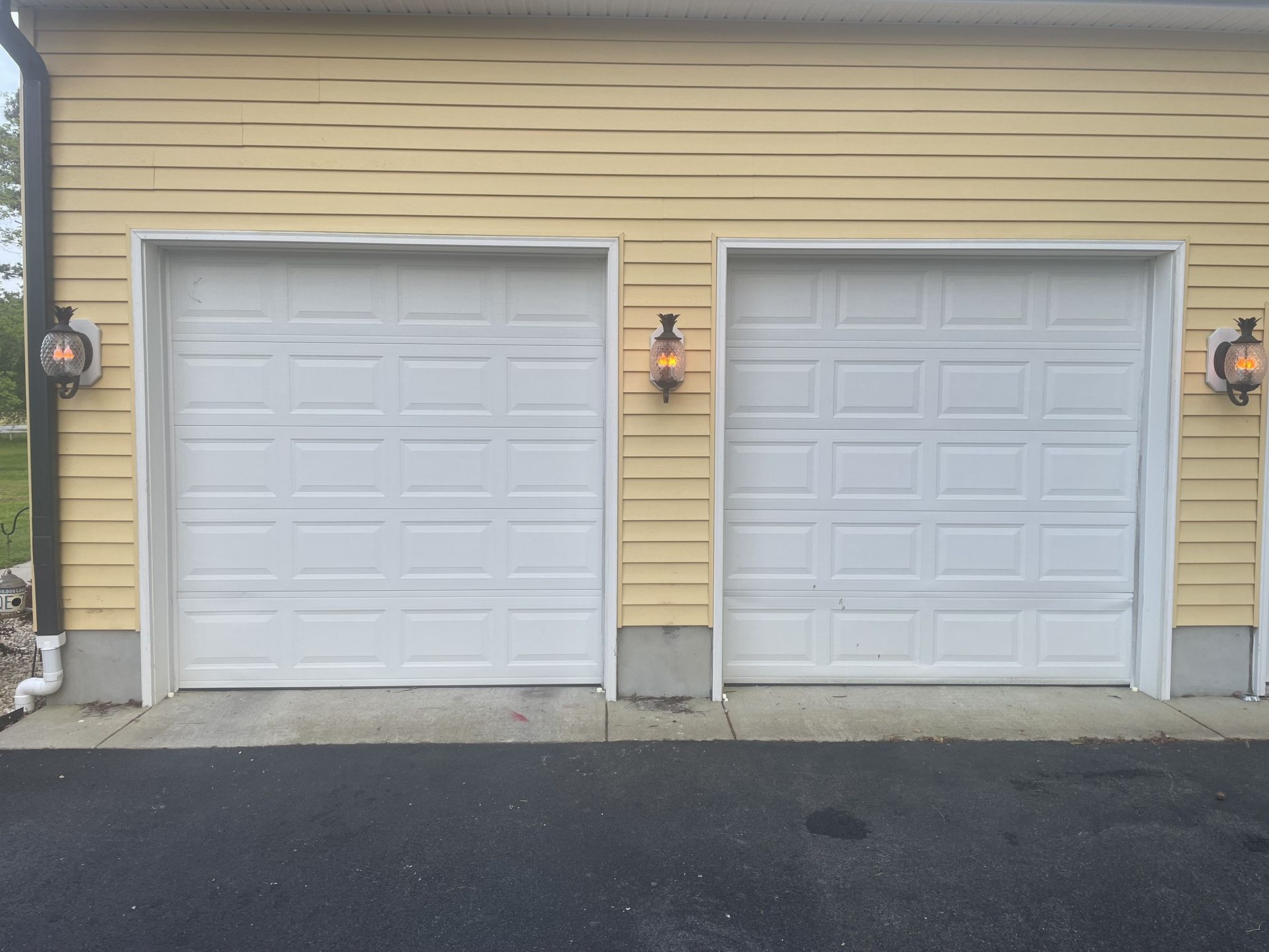 2 steel installed garage doors in great condition, Comes with hardware, 2 door remote  This would be perfect if you building a shed. The doors will be