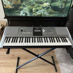 Keyboard Piano With Stand .  Model ????? Maybe 330