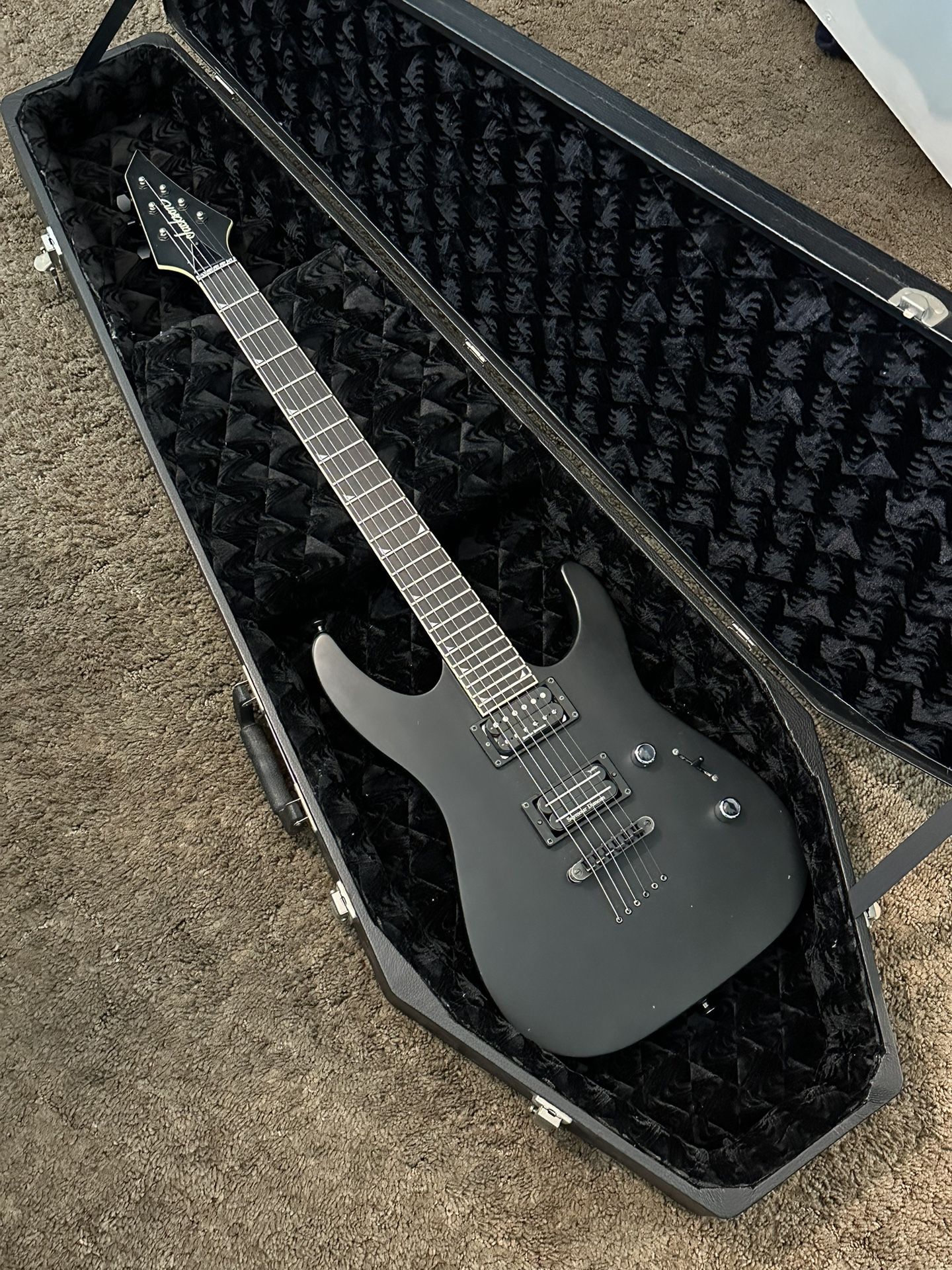 Satin Black 2002 Jackson SLSMG Soloist (with Duncan upgrades and Coffin Case)