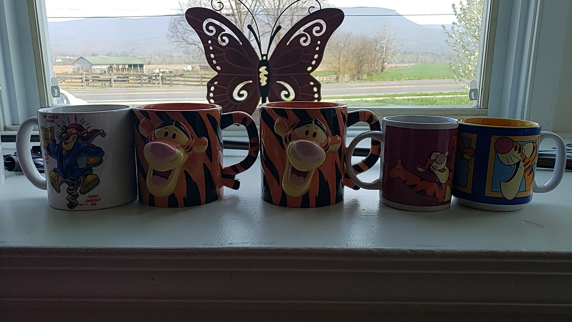 Tigger Mugs & Blue Flower Kitchen Canisters.