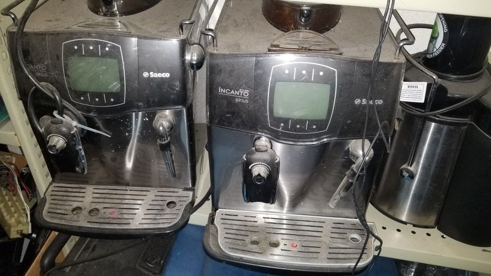 2 Saeco Incanto Sirius Espresso Machines.