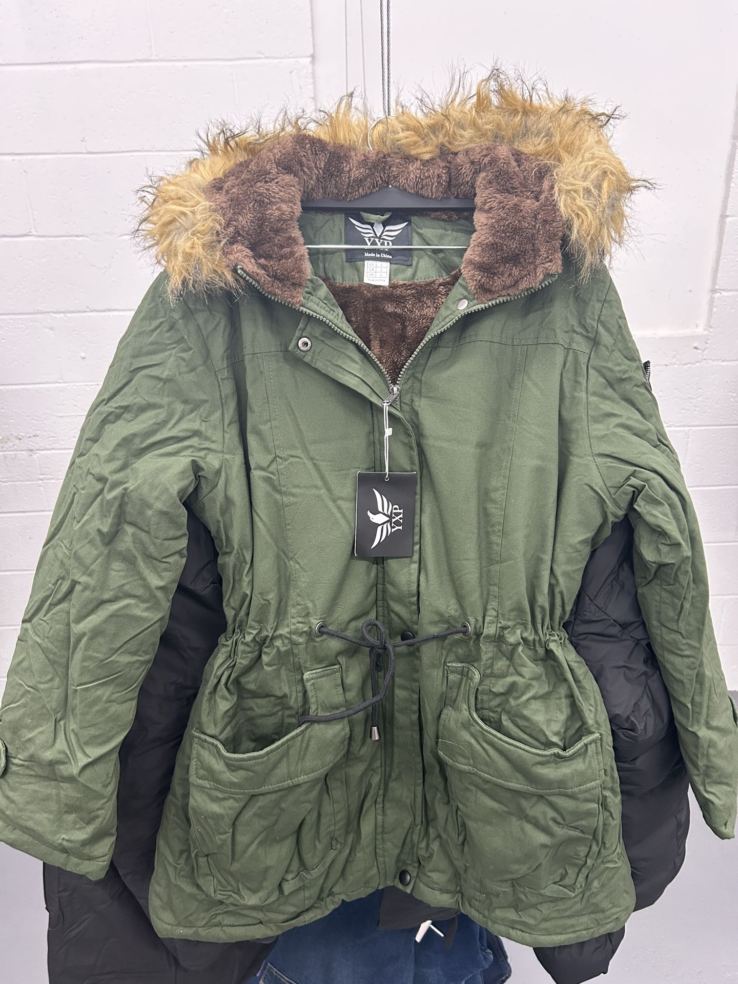 Woman’s Green Hooded Fur Puffer Jacket