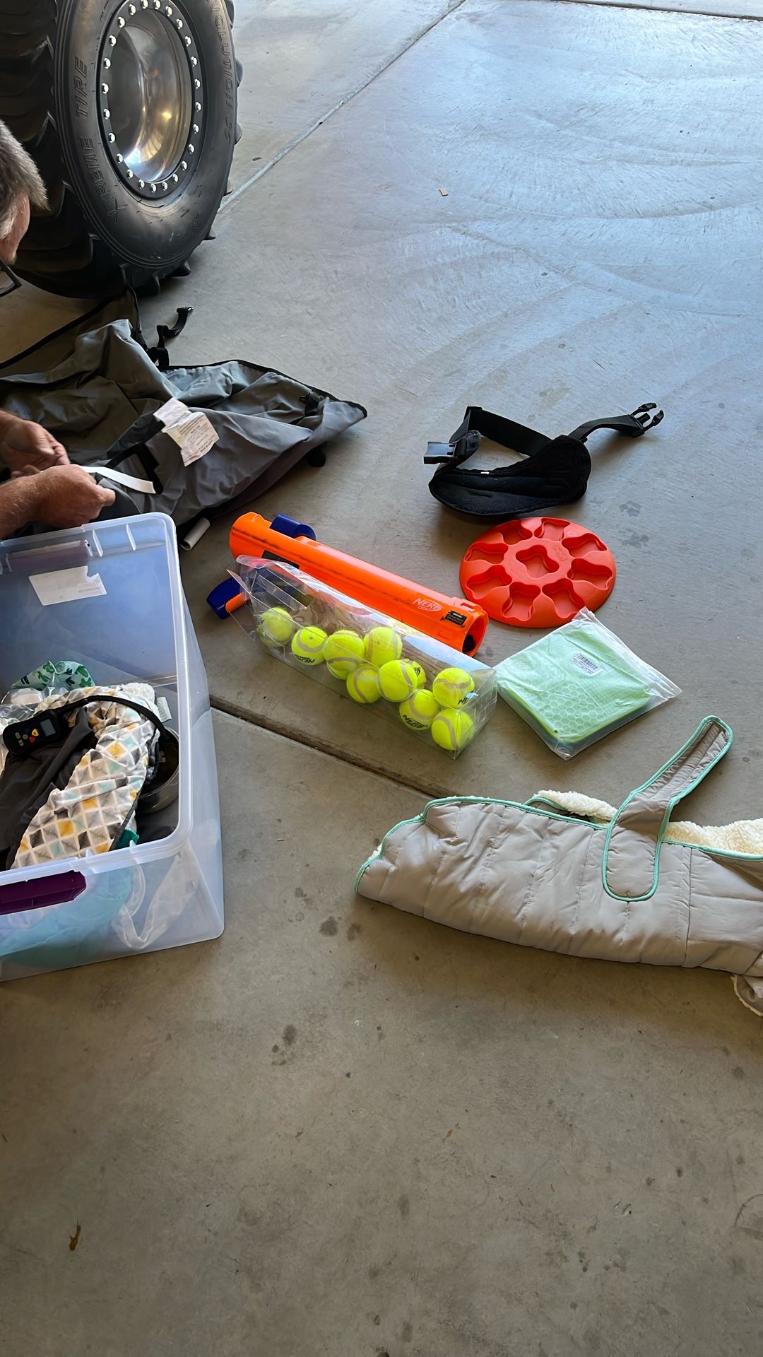 Assorted Dog Items Body Suit Seat Cover Lick Pads Ball Shooter With Balls Etc