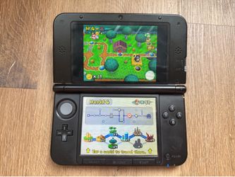 Nintendo 3DS XL with Mario Bros. Game
