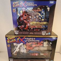 Street Fighter 2 X Transformers Optimus Ryu vs Megatron BISON Ken vs Chun-Li Lot of 2 NEW