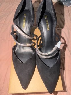 Black tinstree heels