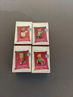 4 Hallmark keepsake ornaments