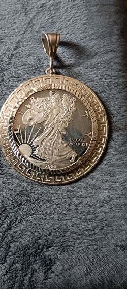 Silver pendant with silver eagle coin