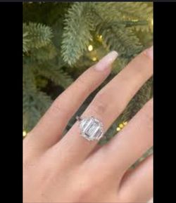 $350 🎀 Three-stone emerald-cut diamond engagement ring.