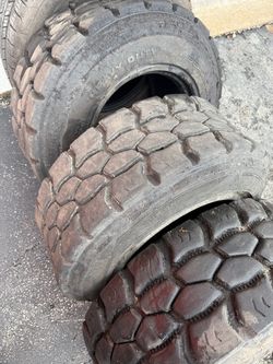 Used Heavy Duty  12/16.5 tires set of 4