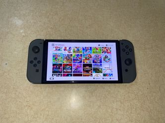 NINTENDO SWITCH OLED + 100 POPULAR SWITCH GAMES