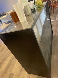 Two glass display cases display case