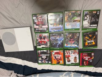 X Box one w/ 12 game discs
