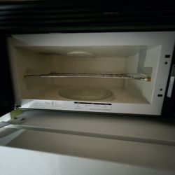 18 cu ft GE refrigerator and 30 x 17.5 Whirlpool microwave